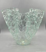 Front and side view of textured glass handkerchief vase