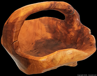 Burled wood basket side view showing interior and handle
