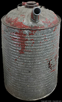 Full view of cylindrical galvanized gas can showing spout, handle, red paint remnants, dents