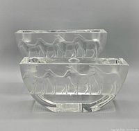 Front view showing both crystal candleholders and zebra motif relief