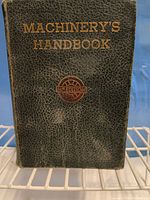 Front cover showing title and emblem