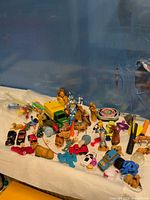 Wide view of assorted small toys on table