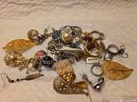 overview of all mixed jewellery components spread on surface