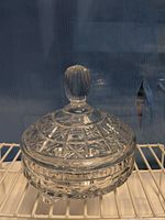 Covered cut glass candy dish front view