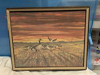 Full view of framed painting showing artwork and frame