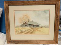 Full view of framed watercolor painting