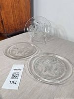 All three plates displayed, showing overall design