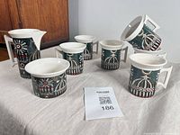 All eight Magic City pieces displayed