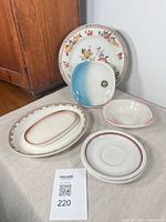 Overview of all five ceramic pieces on table