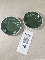 Pair of green Dunloe Castle 4 in nut dishes with MaxSold tag