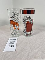 Front view of both glasses showing character graphics