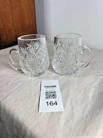 Front view of both Waterford crystal tankards showing pattern and size reference