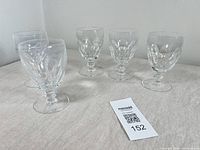 Five Waterford Kathleen crystal wine glasses standing