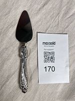 Full view of pie/cake server showing stainless blade and sterling handle