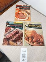 Front covers of three Good Housekeeping cookbooks