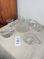 Group shot of all seven crystal and glass items