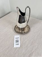 Pitcher and side plate full view