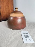 Jar with lid in place, showing overall form and glaze