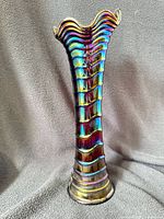 Full view of purple iridescent ripple vase front