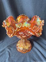 Fruit bowl mounted on pedestal showing overall form and iridescence