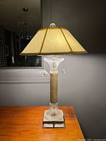 Full view of lamp with shade illuminated