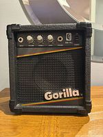 Front view of Gorilla GG-10 amplifier showing control panel and grille