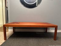 Front view of teak coffee table