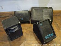 Four Yorkville Elite speakers on floor showing fronts