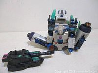 Megatron figure front with tank accessory