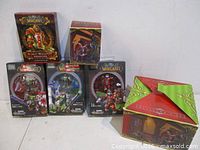 Group shot of Scarlet Monastery deck, Feast Of Winter Veil box and three Mega Bloks figure packs