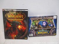 Front view of both strategy guides showing cover art and box