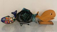 All three fish-themed decor items side by side