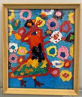 Front view of framed collage artwork