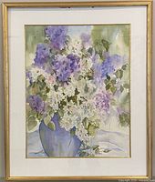 Full view of framed watercolour painting in gold frame