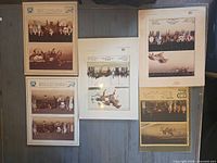 Overall view of five press photographs: four mounted, one loose