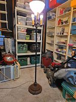 Full view of floor lamp showing uplight shade, multi-arm design and overall height