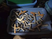 Mixed assortment of barbed tee connectors in tote