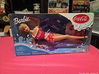Front view of sealed Coca-Cola Splash Barbie doll box
