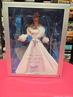 Front view of boxed Holiday Visions Barbie Reina de las Nieves doll