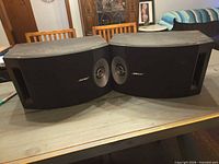 Front view of both Bose 201 V speakers side by side