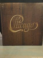 front cover with carved wood Chicago logo