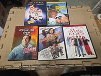 Front view of five DVD cases showing cover art