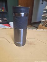 Full view of stainless steel Contigo Autoseal travel mug