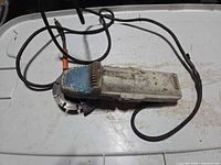 Angle grinder full view with cord, wheel, guard