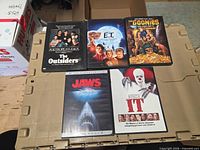 Front covers of all five DVD cases