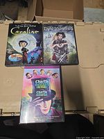 Front covers of all three DVD cases