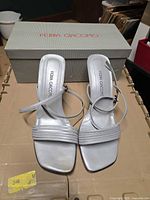 Sandals front view on shoebox showing overall design