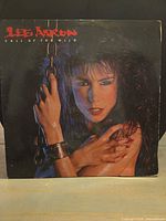 Front album cover with artist image and title