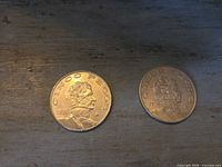 Both 5-peso coins showing obverse sides and dates