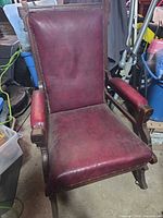 Front view of Mission oak armchair showing upholstery, frame, overall condition